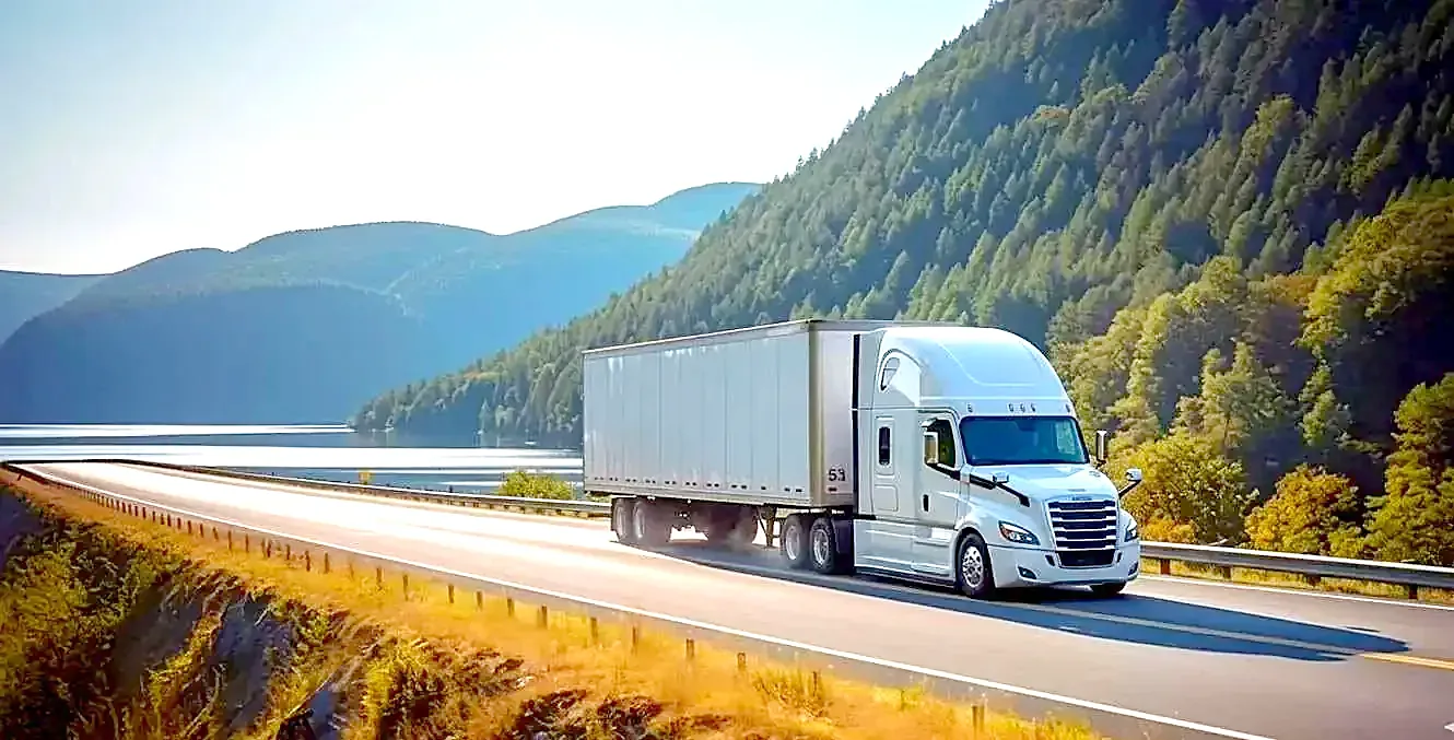Signal Transportation truck on a lakeside highway
